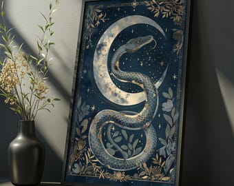 May include: A framed rectangular wall art print featuring a dark blue background with a coiled snake centred in front of a large crescent moon. The illustration includes gold-toned botanical accents, stars, and a decorative border frame.