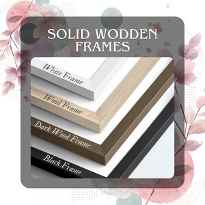 a collection of solid wooden frames in various colors, including white, light brown, dark brown, black, and black and white. The frames are arranged in a row, showcasing the different color options available.