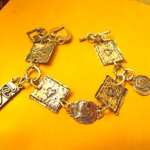 Great One of a Kind -- All STERLING Silver Artisan Handmade, 5-HEART Links & 4 Heart Dangling CHARMS, Heart Toggle Clasp Bracelet