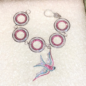 Sublime SILVER RHODIUM 7 1/2&quot; Fuchsia Micro Pave & Clear Baguette Link Bracelet w/cz Lobster Clasp and Multi Colored Pave BIRD Pendant