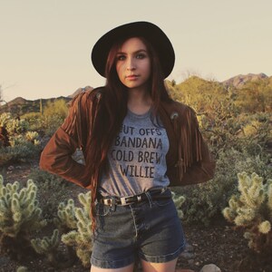 Grey womens and unisex top. Says Cut Offs Bandana Cold Brew Willie.  Inspired by our love of Willie Nelson.