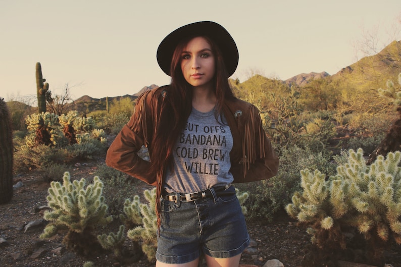 Grey womens and unisex top. Says Cut Offs Bandana Cold Brew Willie.  Inspired by our love of Willie Nelson.