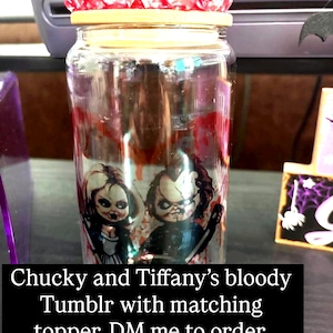 Scary Bloody 16 0z Tumbler with bloody lid and knife.