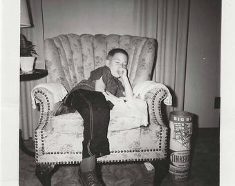 Vintage Boy in Floral Armchair Photo | 1960s Black and White Photograph