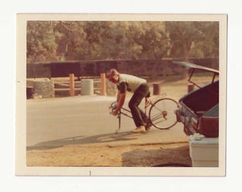 1970s Candid Snapshot | Man Repairing Bicycle, Roadside Ephemera