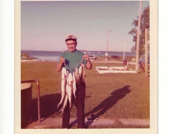 Vintage 1972 Lake Fishing Photo: Man with Catch, Summer Scene