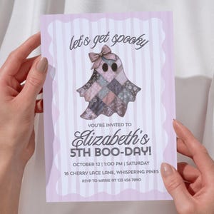 May include: A light purple Halloween invitation with a ghost illustration and the text "let's get spooky". The invitation reads "Elizabeth's 5th Boo-Day!" with event details. Held by hands.