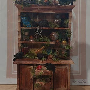 handmade witch cabinet scene