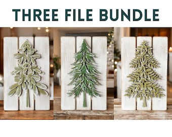 May include: Three wooden signs with a white background and a green Christmas tree design. The trees are made of layered wood and have a rustic, distressed look.