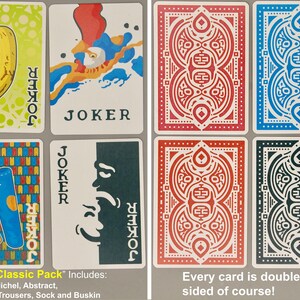 May include: A deck of playing cards featuring unique Joker designs and patterned backs. The Joker cards showcase illustrations of a banana, abstract art, pants, and a profile. The backs have red, blue, and black symmetrical patterns.
