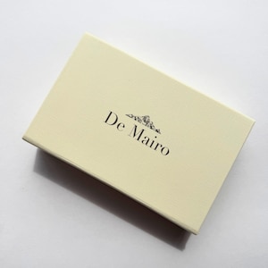Cream De Mairo product box for premium Sare Sang Blue gemstone oil paint set.