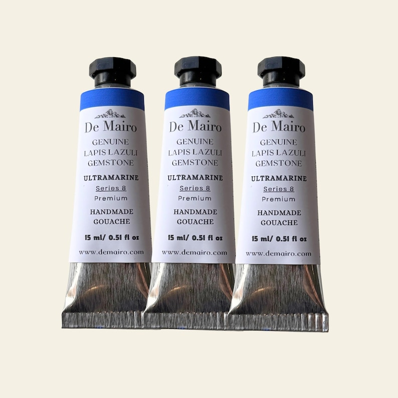 Three De Mairo ultramarine blue gouache paint tubes lined up for gemstone artist paint listing.