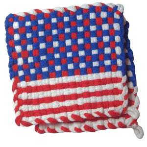 May include: Woven pot holder with a patriotic design. The top portion features a blue background with red and white squares, while the bottom has red and white stripes. The edges are finished with a white border and a small loop.