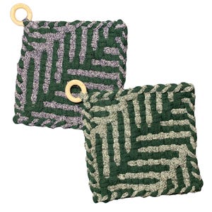 May include: Two square, woven pot holders in shades of green and gray, with a geometric pattern. Each pot holder has a wooden ring attached for hanging. The pot holders are designed for kitchen use.