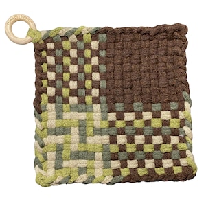 May include: A square, woven potholder in shades of brown, green, and beige. The potholder has a wooden ring attached to one corner. The text "friendly looms" is printed on the wooden ring.