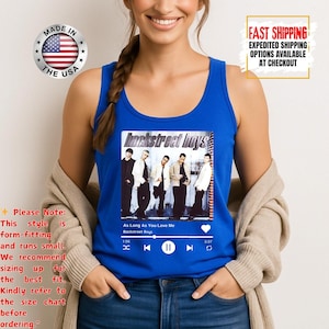 May include: A blue tank top featuring a graphic of the Backstreet Boys album cover for "As Long As You Love Me." The tank top has a music player interface graphic and the text "Made in the USA."