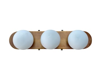 Milk Glass Sconce Light With Antique Brass Finish.