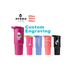 May include: Five HydroJug tumblers in pink, light pink, light blue, coral, and black, featuring custom silver engravings of a bird, the name Emily, the word Chips, and a fox. The text HydroJug and 20oz, 32oz, 40oz, and Custom Engraving are visible.