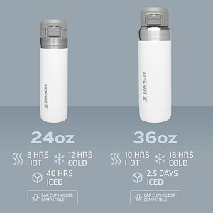 May include: Two white Stanley insulated travel mugs. The 24oz mug keeps drinks hot for 8 hours, cold for 12 hours, and iced for 40 hours. The 36oz mug keeps drinks hot for 10 hours, cold for 18 hours, and iced for 2.5 days. Both are car cup holder compatible.