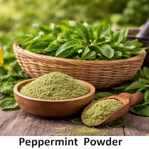 May include: A still life image featuring peppermint powder in a wooden bowl and scoop, fresh green leaves in a woven basket, and a small glass bottle of oil. The text "Peppermint Powder" is at the bottom.