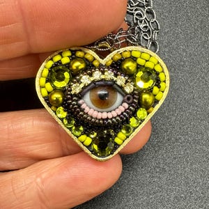 Small Eye Heart Pendant Necklace by Betsy Youngquist (brown)