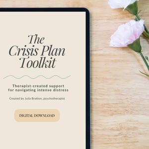 May include: A digital tablet showing "The Crisis Plan Toolkit" with text about therapist-created support for intense distress. The tablet is on a wooden surface, with two white and pink carnations. The digital download is created by Julia Bratton, psychotherapist.