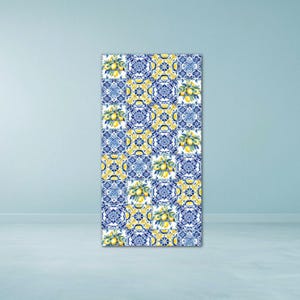 May include: A rectangular panel featuring a repeating pattern of blue and white tiles with yellow lemons. The design has a Mediterranean aesthetic, with floral and geometric elements. The lemons add a pop of color.