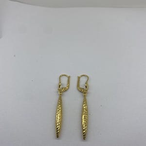 14k yellow gold teardrop diamond cut dangling earrings