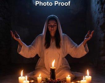 May include: A woman in a white hooded robe sits surrounded by lit candles and a bowl of flowers. The text "Fast Results Photo Proof" is at the top of the image. The scene is dimly lit, creating a mystical atmosphere.