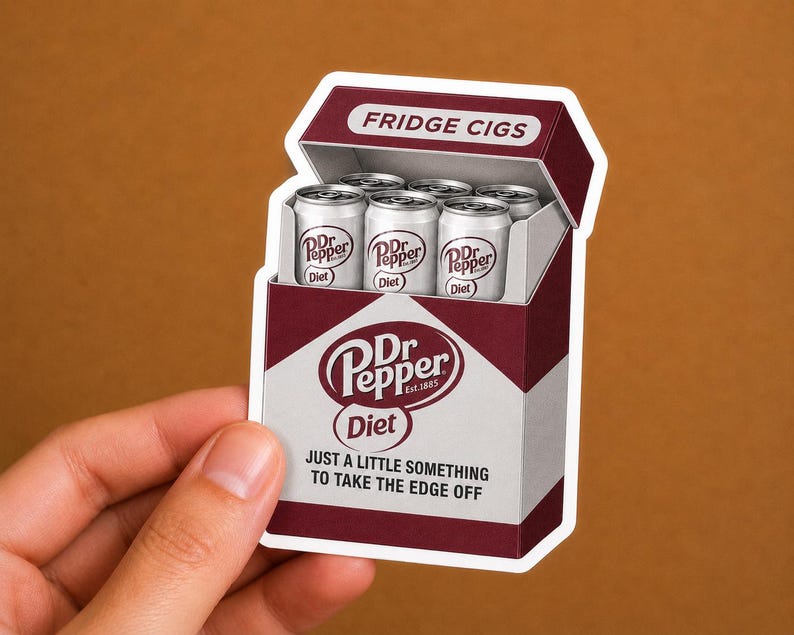 May include: A die-cut sticker shaped like a cigarette pack with a maroon and white design. The pack is labeled FRIDGE CIGS and contains six silver soda cans labeled Diet Dr Pepper. The front features the Dr Pepper logo and the text JUST A LITTLE SOMETHING TO TAKE THE EDGE OFF.