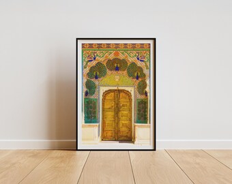 May include: Framed art print featuring a detailed illustration of a golden arched doorway. The artwork showcases intricate patterns, peacock motifs, and vibrant colors, including green, blue, and yellow. The print is set against a white wall and wooden floor.