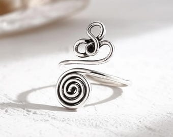 Handgemaakte sterlingzilveren spiraalring: minimalistische boho-sieraden