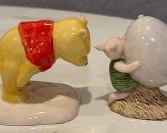 Royal Doulton Piglet with The Balloon and Pooh & The Paw Marks -set of 2