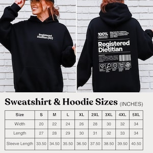 Pu&ograve; includere: Felpa con cappuccio nera con la scritta "Registered Dietitian (RD)" sul davanti e "Registered Dietitian" sul retro. Il retro presenta anche una grafica con testo. La tabella delle taglie mostra le misure in pollici, con larghezze da 51 a 86 cm.