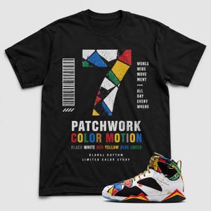 May include: A black short-sleeve t-shirt featuring a large number 7 filled with a multicolored geometric patchwork pattern. The design includes a barcode graphic, the text WORLD WIDE MOVEMENT ALL DAY EVERY WHERE, PATCHWORK COLOR MOTION, and GLOBAL RHYTHM LIMITED COLOR STUDY.