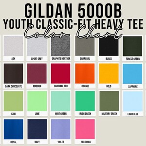 May include: Color chart for Gildan 5000B Youth Classic-Fit Heavy Tee shirts. The chart displays a variety of colors, including white, ash, sport grey, graphite heather, charcoal, black, forest green, and purple. Other colors include red, dark chocolate, maroon, cardinal red, orange, gold, sapphire, light pink, daisy, kiwi, lime, mint green, Irish green, military green, light blue, azalea, carolina blue, royal, navy, violet, and heliconia.