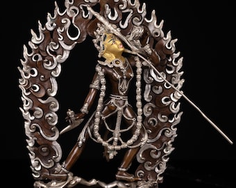 Estatua tibetana Vajra Yogini tallada a mano: Escultura de cobre con rostro dorado y detalles en óxido de plata.