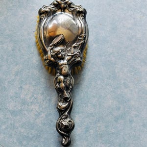 A superb Antique Art Nouveau Silver plated brush