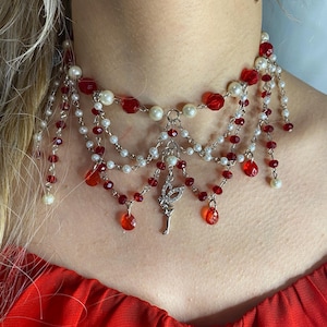 Fairy Masquerade Choker – Red & Pearl Layered Necklace with Crystal Fairy Charm