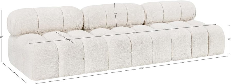 K&ouml;nnte beinhalten: Cremefarbenes Dreisitzer-Sofa mit strukturiertem Boucl&eacute;-Stoff. Das Sofa ist 284 cm lang, 86 cm tief und 71 cm hoch. Die Sitzh&ouml;he betr&auml;gt 43 cm. Die R&uuml;ckenkissen sind zylindrisch. Das Sofa hat ein modernes Design.