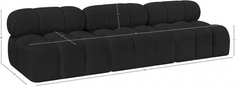 K&ouml;nnte beinhalten: Ein schwarzes Dreisitzer-Sofa mit getuftetem Design. Das Sofa ist 260 cm lang, 86 cm breit und 71 cm hoch. Die Sitzh&ouml;he betr&auml;gt 43 cm. Das Sofa hat einen modernen, minimalistischen Stil.