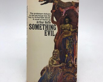 May include: A vintage paperback book cover with a colorful illustration of a woman in a long dress, a creature with a long snout, and a statue. The book title is "Something Evil" by Arthur Hoffe.