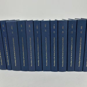 May include: A collection of navy blue hardcover books titled "Proceedings of the Society of Antiquaries of Scotland." The spines display volume numbers and years, including 134 (2004), 136 (2004), and 135 (1995).
