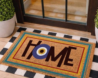 Felpudo bohemio de fibra de coco con diseño de ojo turco, decoración mística para exteriores y protección del hogar.