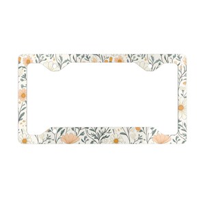 Marco de matrícula metálico con diseño de jardín floral: decoración personalizada para el coche