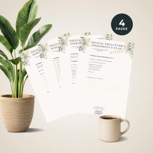 May include: Four-page digital declutter assessment and plan worksheet with floral accents. A beige mug filled with coffee sits next to the worksheets. A potted plant is in the background.