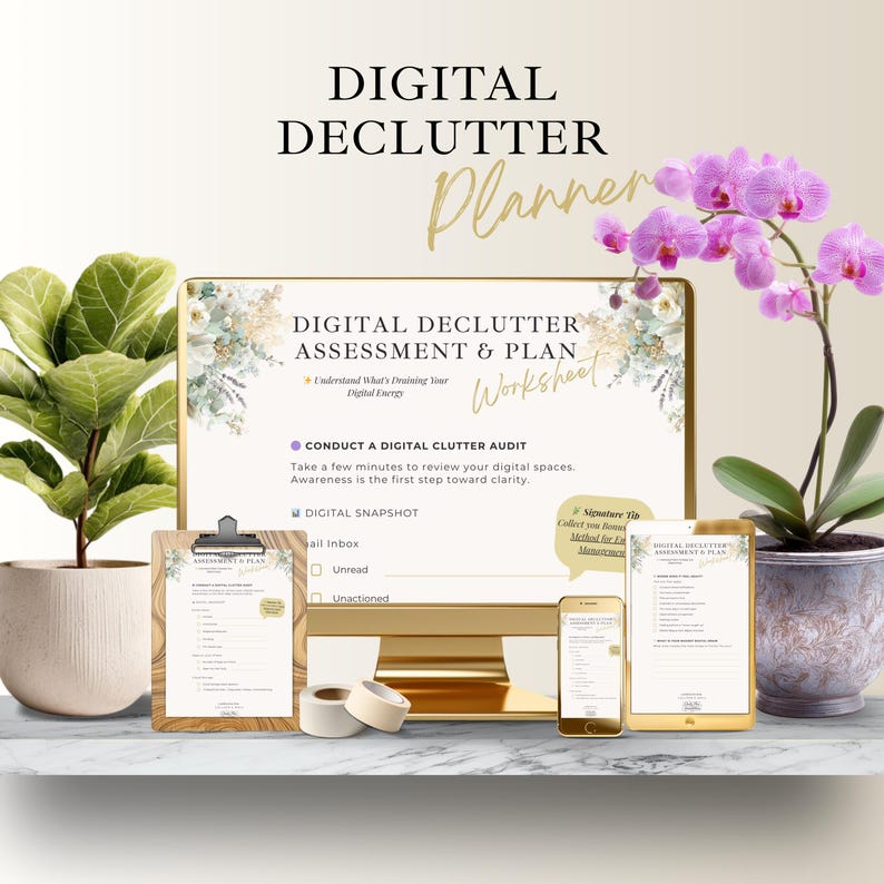 May include: A digital declutter planner with the text "Digital Declutter Assessment & Plan" and "Worksheet". The image includes a clipboard, a smartphone, and a tablet, all with the same design. A potted plant and an orchid are also in the image.