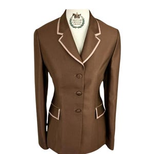 May include: A set of three ceramic mugs with a speckled, matte finish in cream, light grey, and dark grey. Each mug has a simple, minimalist design and a rounded handle.