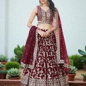 Maroon Jacquard Lehenga choli: Sequence and zari embroidery work chaniya choli