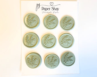 May include: Nine sage green wax seals with a leafy design. The seals are arranged in three rows of three on a white card with the text "Paper Shay Personalized to Perfection".